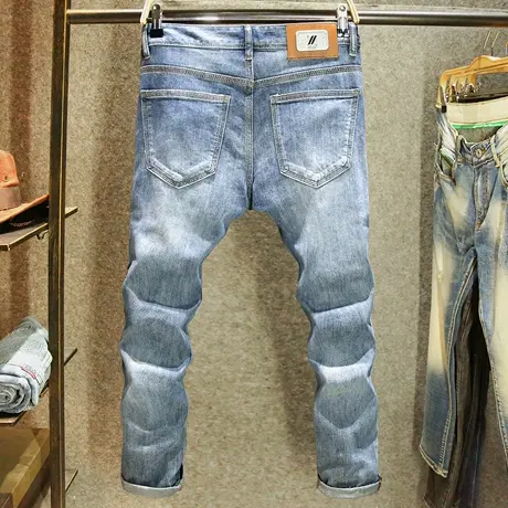 高端轻奢夏季牛仔裤男款弹力修身小脚裤经典水洗蓝色潮流百搭长裤图片