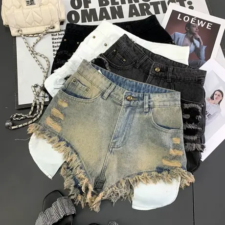 韩版破洞流苏牛仔短裤女2024春夏新款显瘦百搭高腰a字阔腿辣妹裤图片