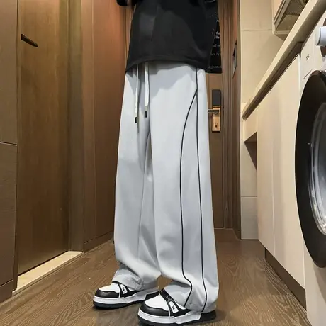 潮牌宽松运动卫裤男春季新款美式休闲阔腿裤直筒长裤垂感西装裤子图片