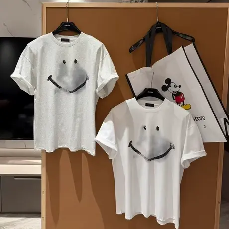 韩国东大门夏季新款时尚宽松休闲百搭笑脸印花垫肩短袖T恤上衣女图片