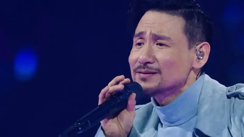 张学友演唱:《一千个伤心的理由》