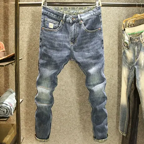 秋冬季新款蓝色牛仔裤男士修身小脚裤高端印花水洗耐磨潮牌长裤子图片