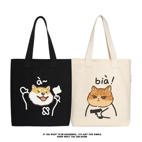 秀洛bia猫a狗日系卡通潮流情侣猫狗互动帆布包托特包袋购物袋书包商品大图