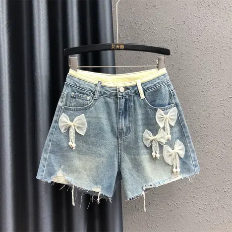 港味洋气蝴蝶结立体装饰牛仔短裤女夏2023新款宽松显瘦毛边阔腿裤图片