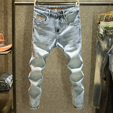 夏季时尚简约男士牛仔裤韩版潮流修身小脚裤小众设计潮牌刺绣男裤图片