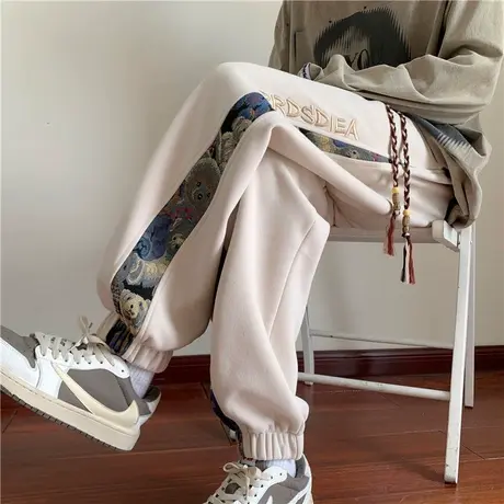 民族风刺绣卡通休闲裤子男秋冬季新款ins潮流抽绳复古束脚裤国潮图片