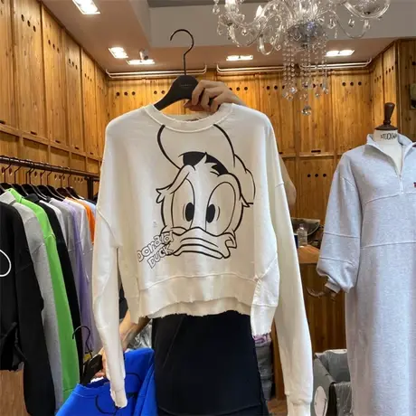 韩国东大门卫衣女春秋薄款2021新款卡通宽松破洞短款ins潮上衣服图片