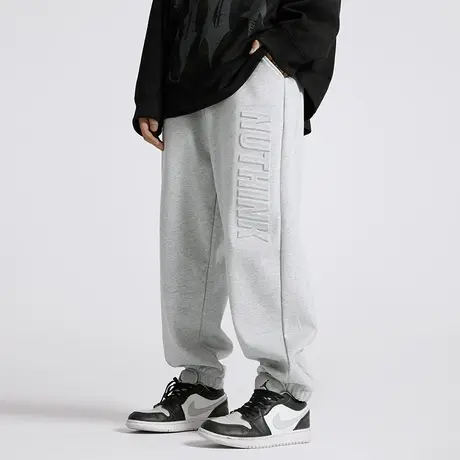 Nuthink国潮简约钢印字母休闲长裤男春季加绒保暖美式潮流束脚裤商品大图