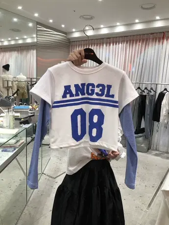 韩国东大门2023春季新款时尚圆领宽松短款长袖假两件拼接T恤女装图片