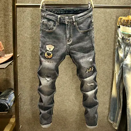 黑灰色烫钻牛仔裤男修身弹力小脚裤高端潮牌小熊公仔图案破洞裤子商品大图
