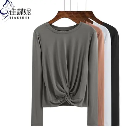 春秋纯白圆领小心机打结体恤宽松短款长袖上衣T恤纯色女装露肚脐商品大图