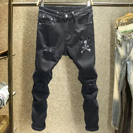 个性潮流骷髅头烫钻牛仔裤男款修身小脚裤潮牌破洞黑色裤子秋冬款商品大图