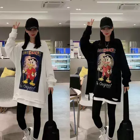 东大门韩版秋季新款上衣宽松百搭中长大版破烂拼接假两件卡通卫衣图片