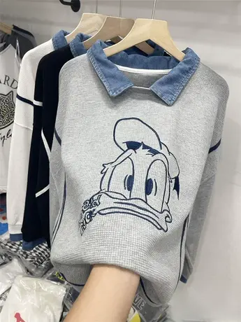 卫衣女春秋薄款2021新款韩版ins潮洋气唐老鸭宽松牛仔拼接上衣服图片