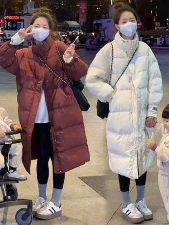 立领过膝加厚长款白鸭绒纯色羽绒服女冬季新款韩货宽松保暖外套潮图片