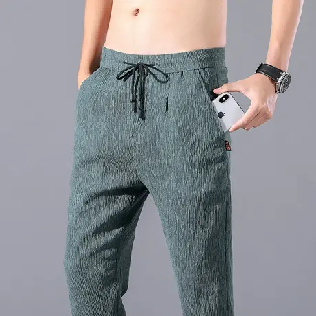 春夏季小雏菊冰丝超薄款夏裤子男士休闲裤亚麻棉麻宽松紧束脚哈伦图片