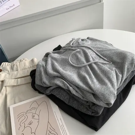 垂坠感纽扣针织连帽女针织衫韩版秋季宽松慵懒风上衣前短后长帽衫图片