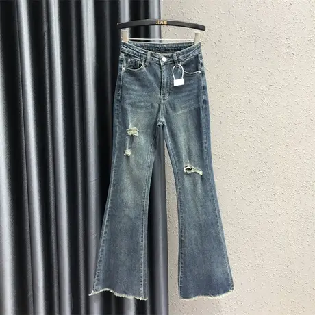 欧货蓝色破洞设计感牛仔微喇裤女2023秋季新款高腰显瘦毛边喇叭裤图片