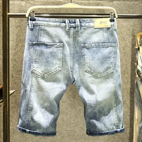 时尚水洗斜袋休闲牛仔短裤男款宽松直筒裤个性拼接设计潮牌中裤子图片