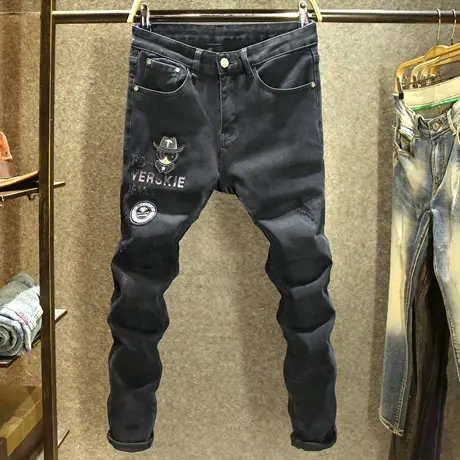 欧洲站高端烫钻牛仔裤男秋冬款修身显瘦裤子男潮牌印花黑色小脚裤图片
