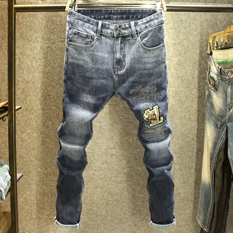 高端大牌烫钻牛仔裤男款弹力修身小脚裤潮牌个性刺绣时尚休闲裤子图片