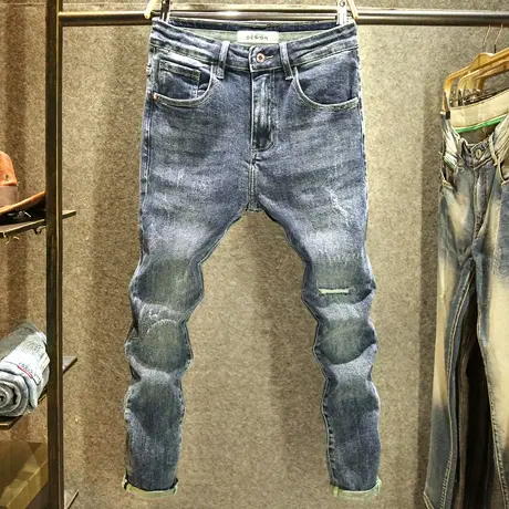 潮流磨破牛仔裤男秋冬款修身弹力小脚裤男士潮牌印花图案补丁裤子图片