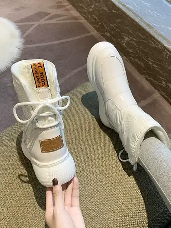 欧洲站厚底雪地靴女冬季新款加绒加厚保暖大棉鞋皮面防滑平底短靴图片