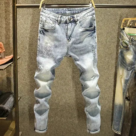 时尚烫印高端面料牛仔裤男百搭修身小脚个性潮牌蜘蛛图案镶钻裤子商品大图