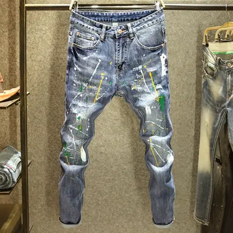 潮牌破洞补丁牛仔裤男款秋季潮流高街泼墨油漆修身小脚刮烂长裤子图片