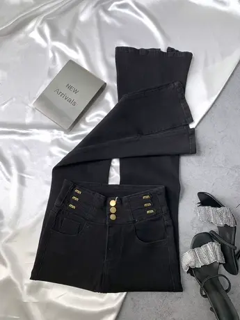 裤脚开叉排扣牛仔喇叭裤女2023秋季新款显瘦百搭小众高腰微喇长裤图片