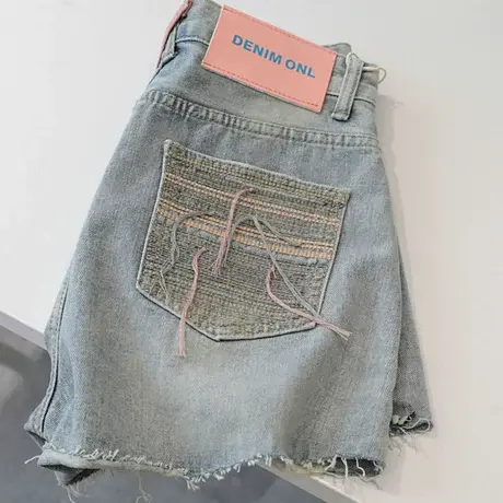 小众du特不撞衫~设计感小众毛边牛仔短裤女高腰显瘦a字阔腿热裤潮图片