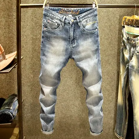 美式个性牛仔裤男修身潮牌小脚裤浅蓝色高端中腰砂洗磨白裤子夏季商品大图