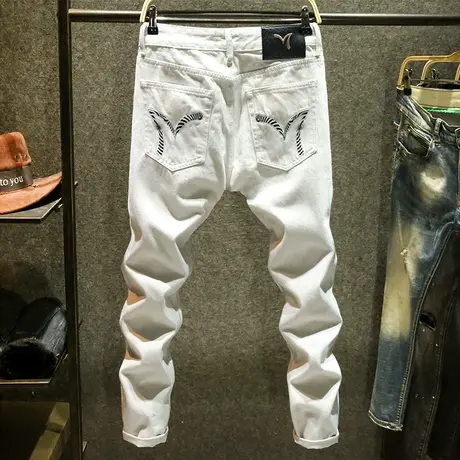 白色纯棉牛仔裤男潮牌修身小脚裤2024新款时尚个性刺绣潮流裤子男商品大图