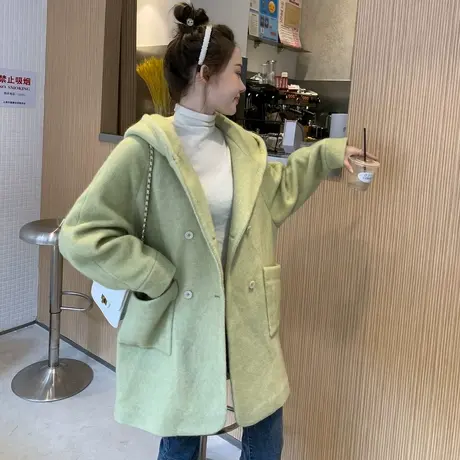 唐狮牛油果绿秋冬毛呢外套女中长款双排扣大衣连帽宽松简约款显瘦图片