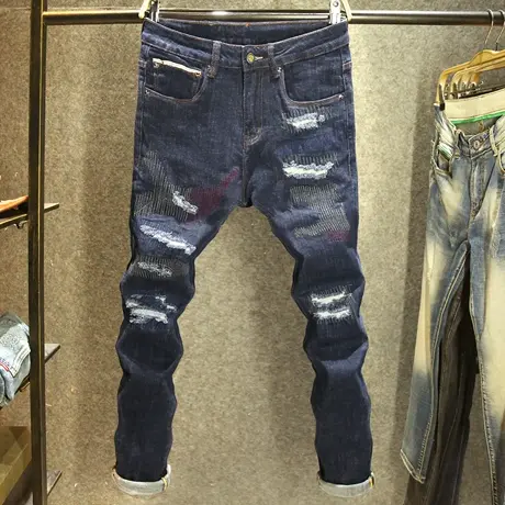 街头痞帅男士牛仔裤原创设计修身小脚裤深蓝色破洞补丁潮牌裤子男图片