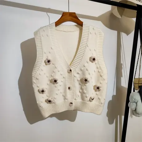 学院风针织马甲开衫女秋冬新款v领百搭立体花朵别针毛衣背心外穿图片