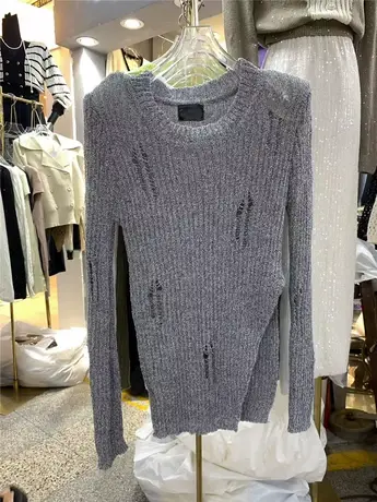 十三行2023秋装新款韩版不规则开叉镂空针织衫女圆领套头长袖上衣商品大图