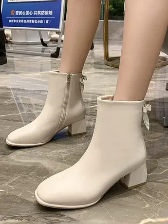 韩系黑色小裸靴女2023秋新款方头粗跟蝴蝶结短筒靴潮流辣妹时装靴图片