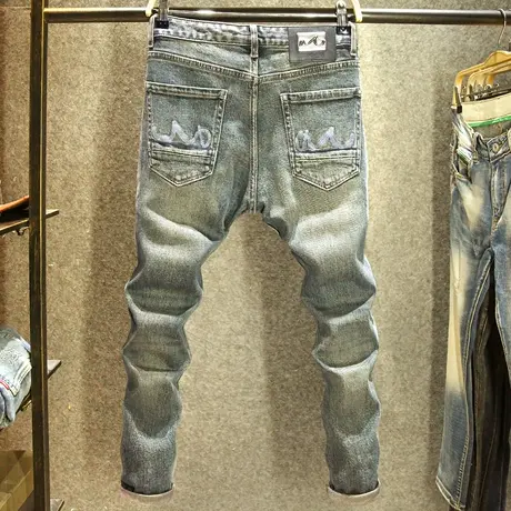 美式怀旧牛仔裤男款韩版修身小脚弹力长裤秋冬款个性刺绣男士裤子图片