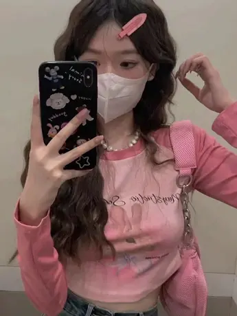 粉色长袖t恤女春秋设计感小众纯欲风甜辣收腰修身短款露脐ins上衣图片
