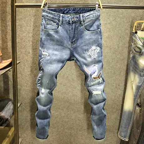 夏季潮牌蓝色裤子男牛仔裤破洞修身小脚裤高端图案刺绣男士长裤薄商品大图