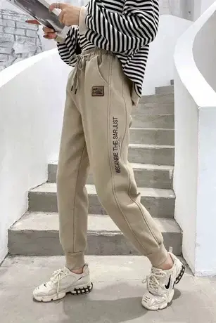 牛仔裤子女春秋宽松束脚高腰显瘦刺绣时尚运动裤保暖哈伦加厚卫裤商品大图