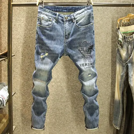 高端大牌烫钻牛仔裤男秋季修身小脚裤时尚潮男破洞补丁裤子春秋款商品大图