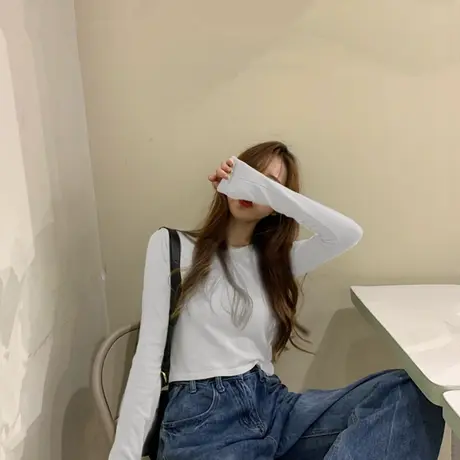 秋季长袖短款小心机上衣设计感高腰露脐修身t恤白色打底衫女内搭图片