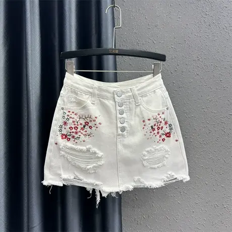 欧货白色刺绣牛仔半身裙女2023夏季新品时尚破洞a字包臀短裙子INS图片