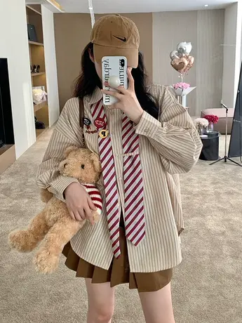 条纹衬衫女2023早春上衣宽松韩版设计感小众法式别致长袖衬衣外套图片