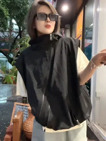 新款小众斜拉链马甲时尚宽松百搭马夹上衣小个子遮肉立领连帽坎肩商品大图