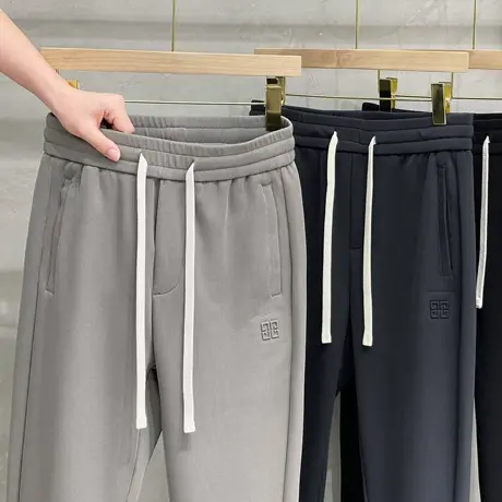 肌理暗纹男士秋季针织运动卫裤潮流帅气休闲长裤学生宽松束脚裤男图片