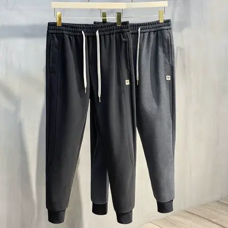 男士运动休闲裤冬季加厚黑色小脚裤子男哈伦裤宽松毛呢裤男长裤子图片