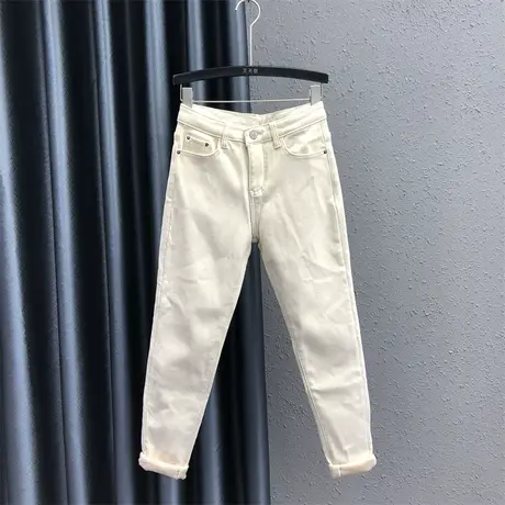 2023冬季新款杏色设计感洋气小众百搭高腰加绒加厚牛仔小脚铅笔裤图片